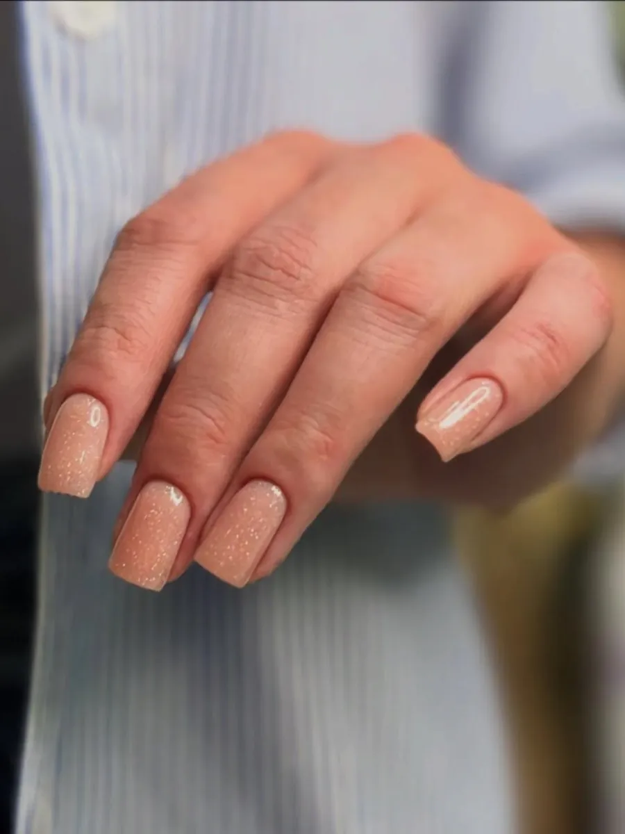 Nude manicure with fine shimmer