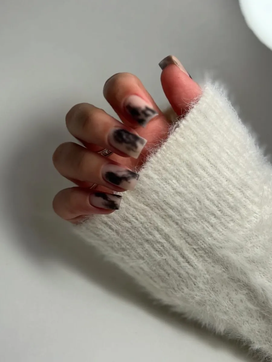 Matte manicure with a smoky design